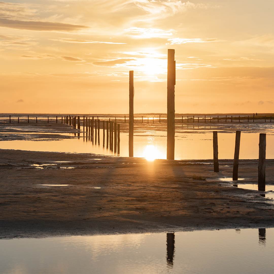 Solnedgangen ved wattensee i St. Peter-Ording